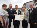 Der Vorsitzende Herbert Barthelmes erhält das Ehrenzeichen des Kolpingwerk Deutschland